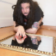A plump goth girl takes a piss and a shit onto a mirror lying on the floor. She shows us her dirty asshole, then poses next to her pile of poop. Presented in 720P HD. 129MB, MP4 file. Over 6 minutes.